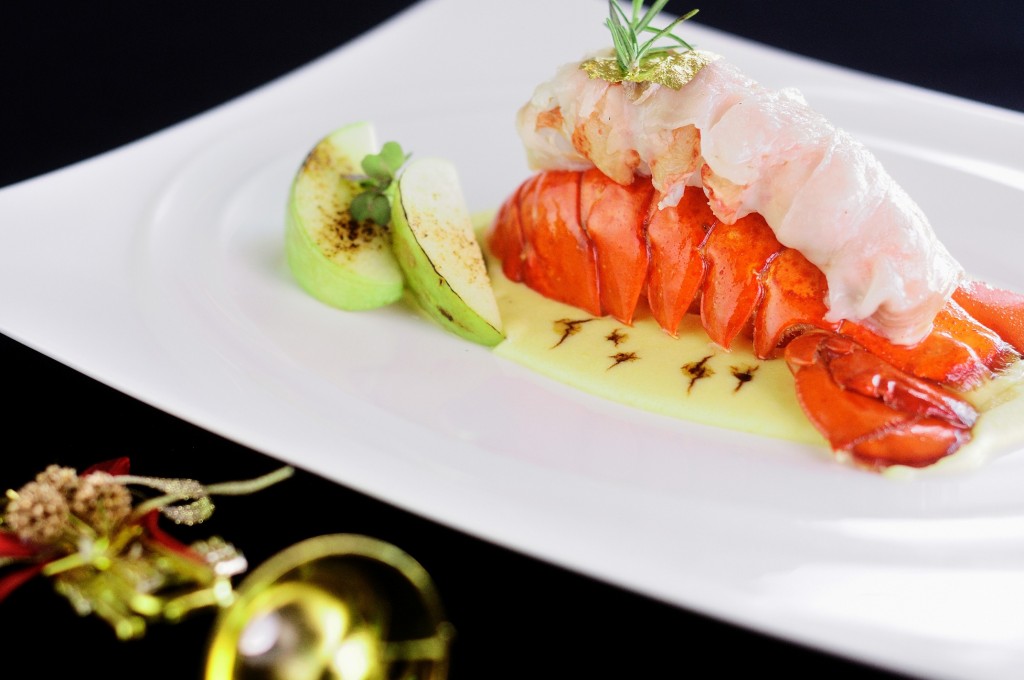 0 Canadian lobster tail wrapped in Colonnata speck served on grass pea puree and aged Modena balsamic drops