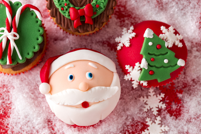 festive Christmas mini desserts over snowy background